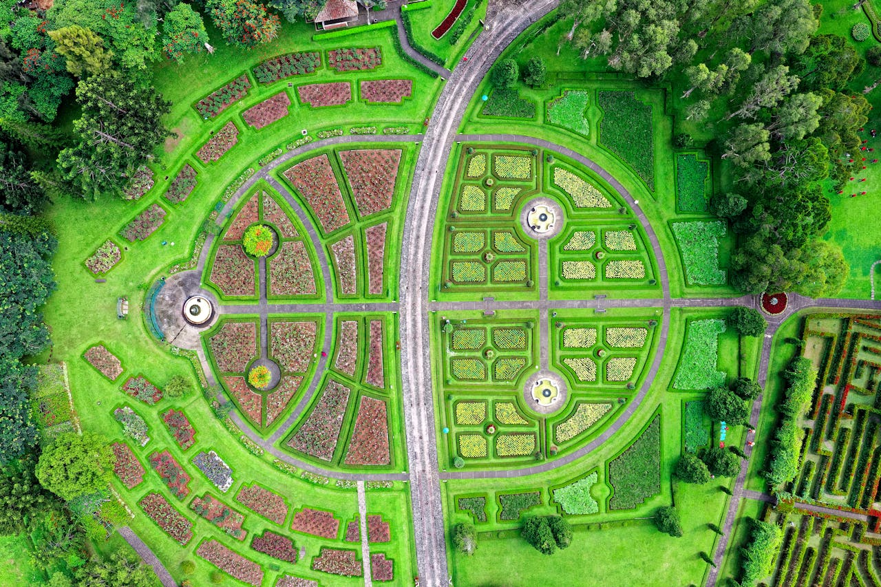 Aerial shot of a vibrant, symmetrical garden layout in Sukaresmi, Indonesia.